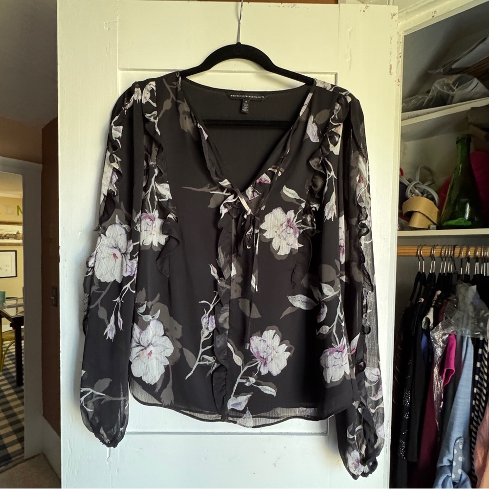WHBM black floral blouse. size S